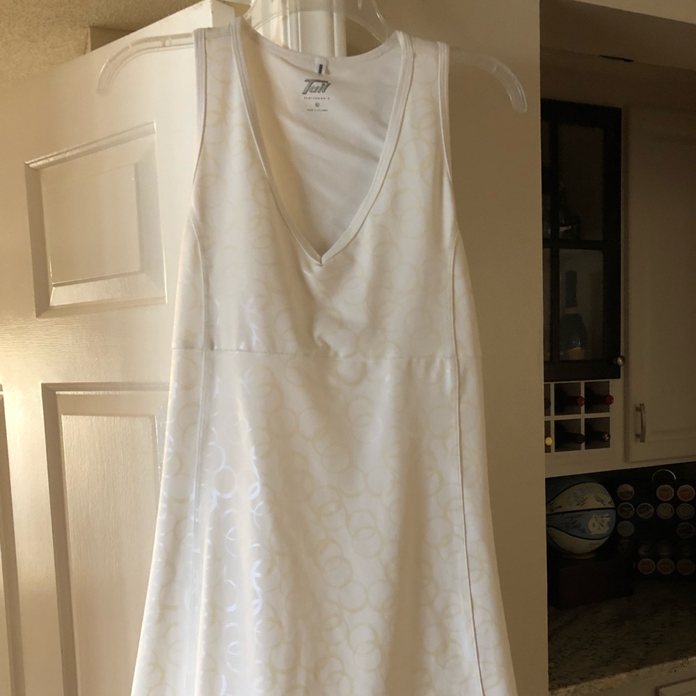 Tail tennis dress, bra sewn in